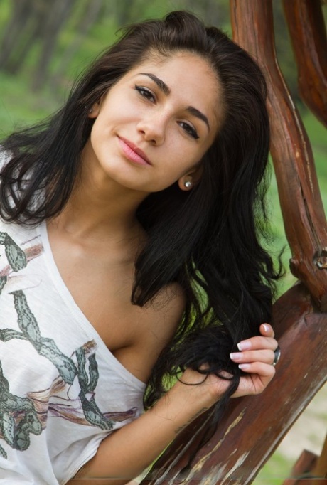 Russian teen Malina A shows her tight ass and pussy on an outdoor bench 62429529