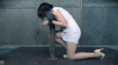Restrained girl Sadie Franklin is caned while wearing pantyhose 94229707