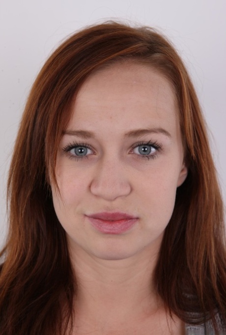 Natural redhead Dominika models clothed before standing totally naked 65616223