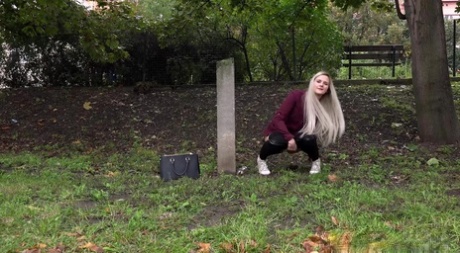 Dirty blonde female can't hold her pee any longer and pisses in public park 10098630