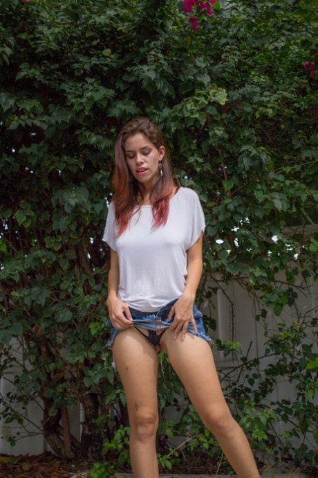 First timer Marina Rossi reveals her big naturals and juicy ass in the yard 10496492