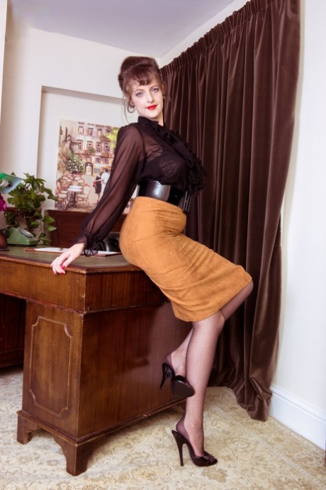 Long legged Kate Anne poses on the desk flaunting her vintage silk stockings 28606506