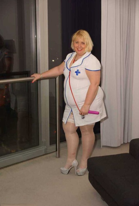 Obese blonde nurse Lexie Cummings masturbates on a sofa with a vibrator 36796174