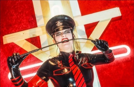 Lesbian women have sexual relations while wearing rubber clothing 94404202