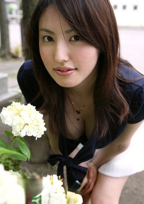Japanese teen Takako Kitahara exposes upskirt panties on slide at playground 13900637
