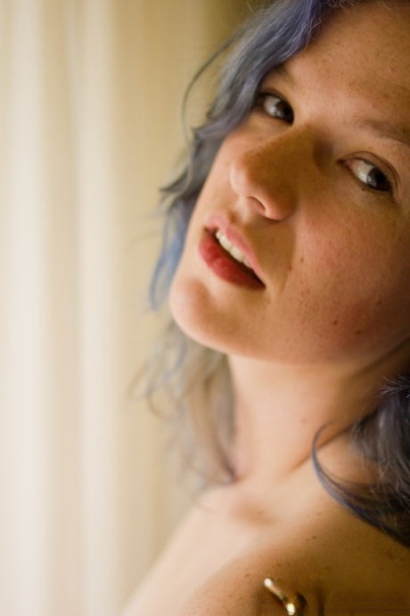 Tattooed girl with dyed hair gets completely naked for the first time 93565976