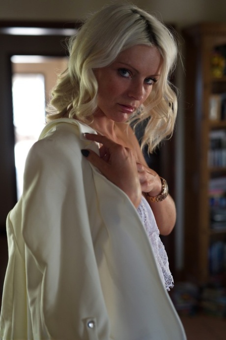 Gorgeous blonde Victoriah works free of all white attire in a sexy manner 59579074