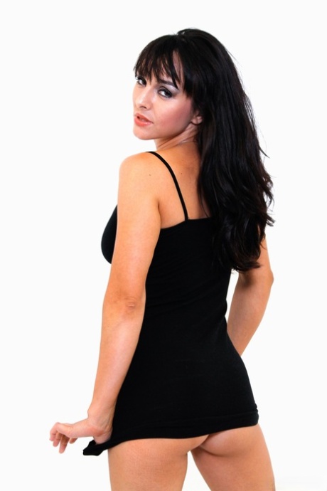 Dark haired MILF Cytherea discards a short dress to pose nude in socks 22868369
