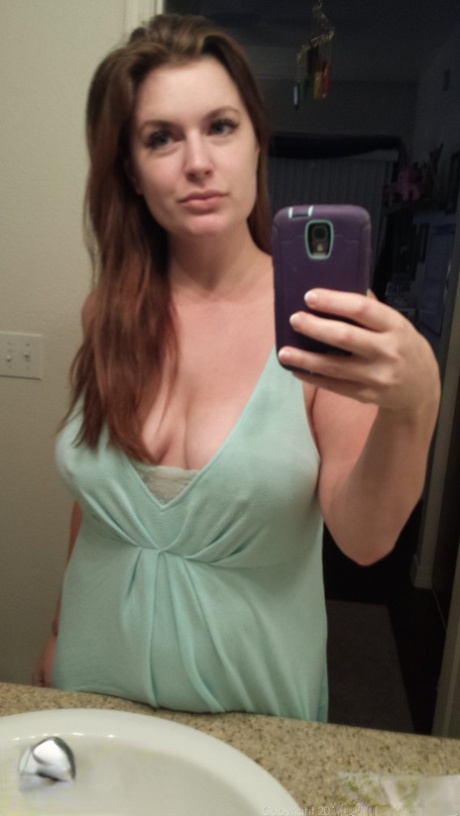 Plump amateur Danielle takes topless and clothed selfies around the house 18469946