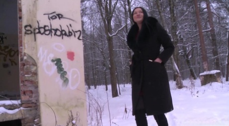 Caucasian woman Dasha pees in abandoned building during the winter 25165975