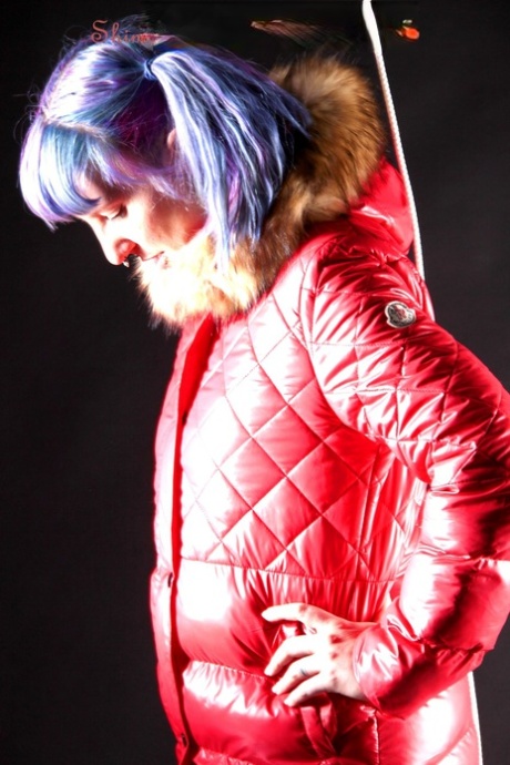 White girl with dyed hair and piercings is tied up in winter clothing 46874580
