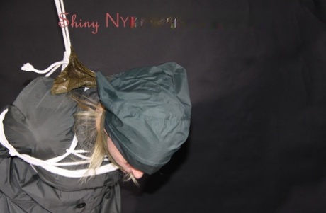 Blonde chick is restrained and gagged in nylon apparel by a woman 89641476
