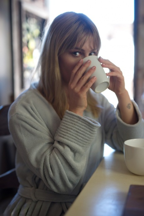 Hot blonde Pippa Doll gets totally naked over her morning cup of coffee 58960822
