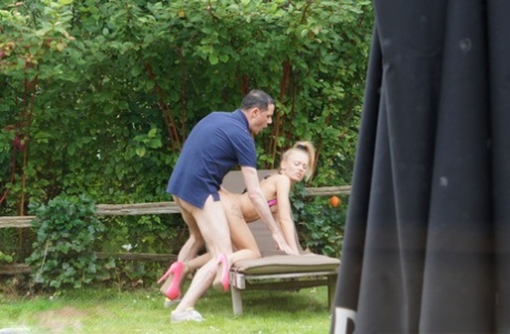 Blonde chick Carmel Anderson masturbates before sex on a backyard lounge chair 92797660