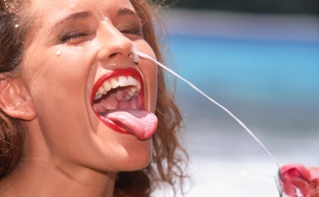 Horny redhead Gabrielle Scream gets double fucked and facialized near the sea 69912721