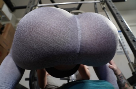 Busty woman Dee Williams sucks and fucks a man during a workout in a gym 86971843