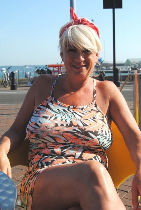 Mature woman Dimonty exposes her big tits and pussy while in public 38800737