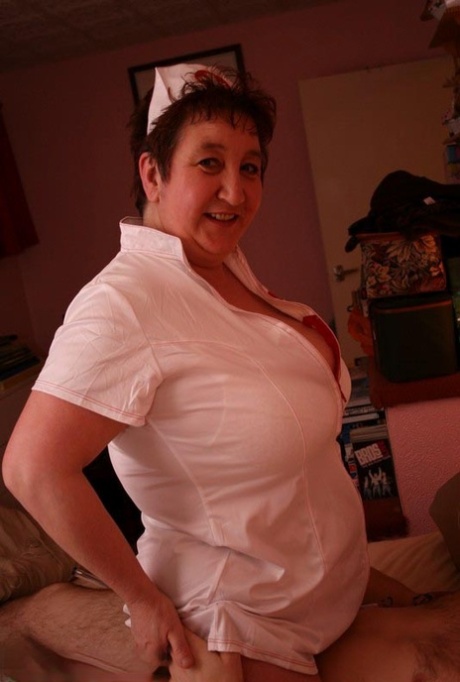 Mature amateur Kinky Carol gets on top of the man while wearing a nurse outfit 52246719