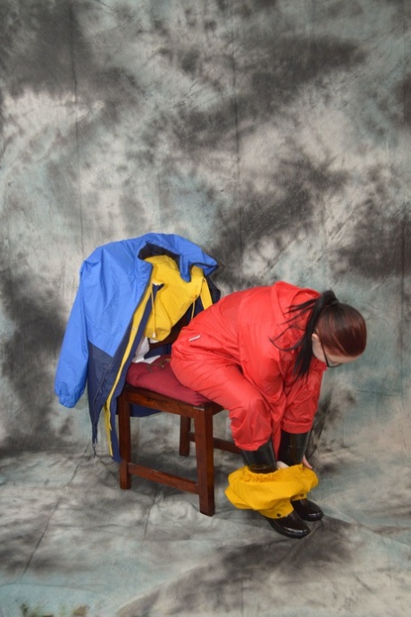 Pale redhead Lady Nadja dons a cleave gag while wearing rain suits 46346049