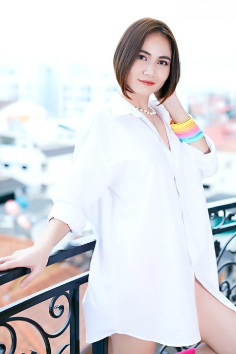 Asian beauty Ellie gets naked on a chair in pink socks and running shoes 55001866