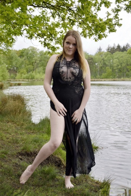 Redheaded amateur Luscious Models models lingerie while in a lake 52474378