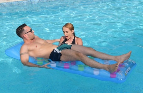Hot redhead Kaisa Nord gives her man friend a blowjob in a swimming pool 54666934