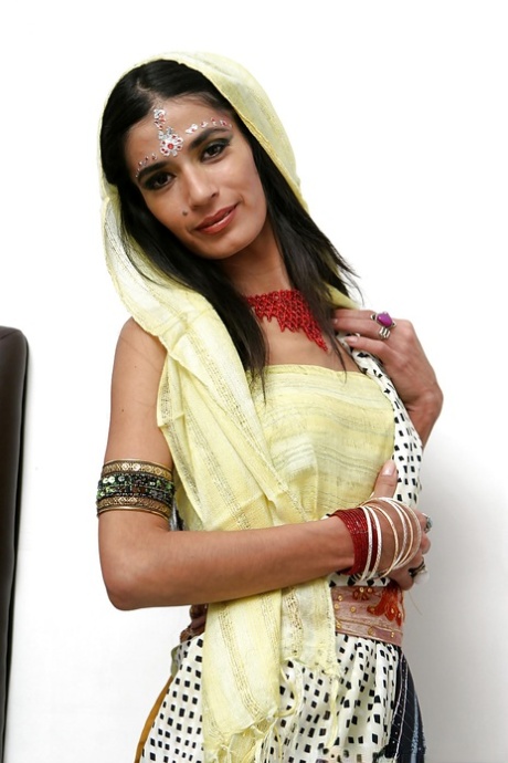 Indian solo model Tamara setting up candles for worship wit her clothes on 86736618