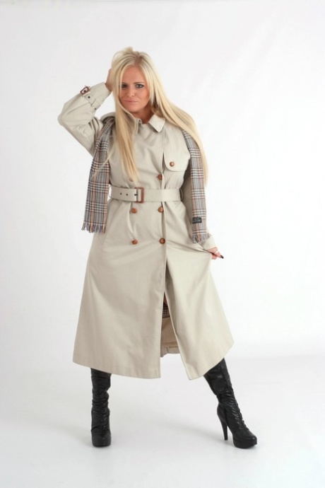Blonde chick casts aside her overcoat to model in lingerie and leather boots 75531660