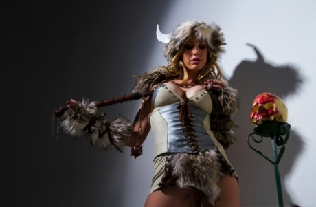 Solo model Brett Rossi frees her big tits and bald pussy from Viking attire 22776080