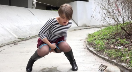 Short haired bitch Shila pulls her sexy panties down in public & takes a piss 30330738