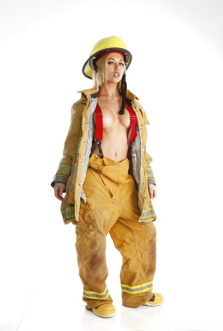 Skinny blonde babe is revealing her tremendous body in a fireman uniform 57283685