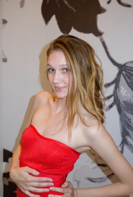 Skinny playful blonde teen Reese Berkman bending over in a store 19475555