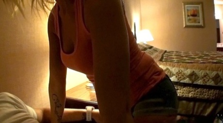 Sexy blonde chick Emily Austin slips off peach colored bra and shorts on bed 13060469