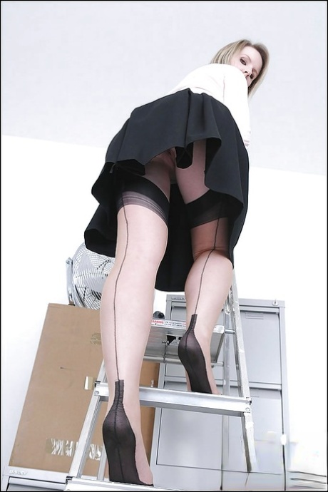 Sexy MILF in stockings doing upskirt and uncovering her big tits 25241899