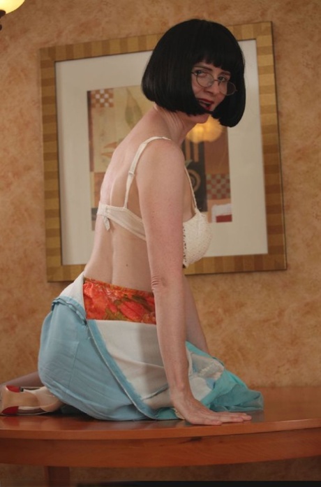 Mature lady in stockings flashing her panties and uncovering her tits 63924288