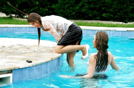 Nikky Thorne has some wet fully clothed pool fun with her lesbian friend 19032406
